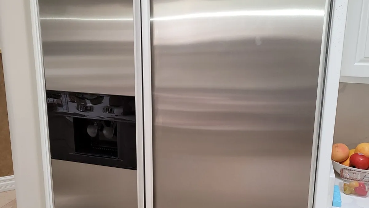 Factory-certified appliance repair technician servicing luxury refrigeration, laundry suites, and cooking ranges in Los Gatos, CA